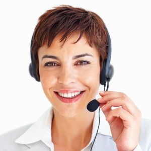 A mature woman wearing headset isolated over white background
